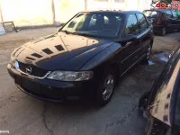 Vindem capota opel vectra b originala culoare neagra in stare perfecta bara 