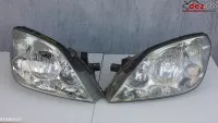 Vand faruri originale de pe auto cu volan pe stanga pretul este...