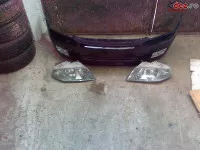 Vand elemente de caroserie pentru audi a4 din 2003 capota faruri 