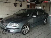Dezmembrez skoda octavia 2 2 0 tdi cutie viteze dsg interior piele comenzi 