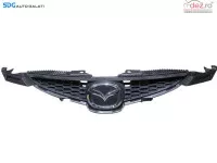 Grila Cu Sigla Emblema Centrala Radiator De Pe Bara Spoiler Fata Mazda 2 2003 2007 (12007214)